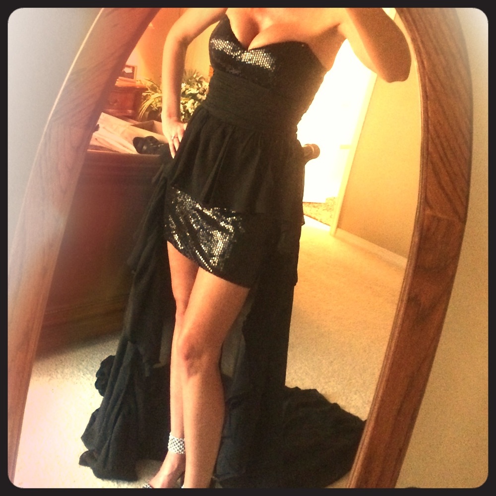 Custom made dress with scalloped train